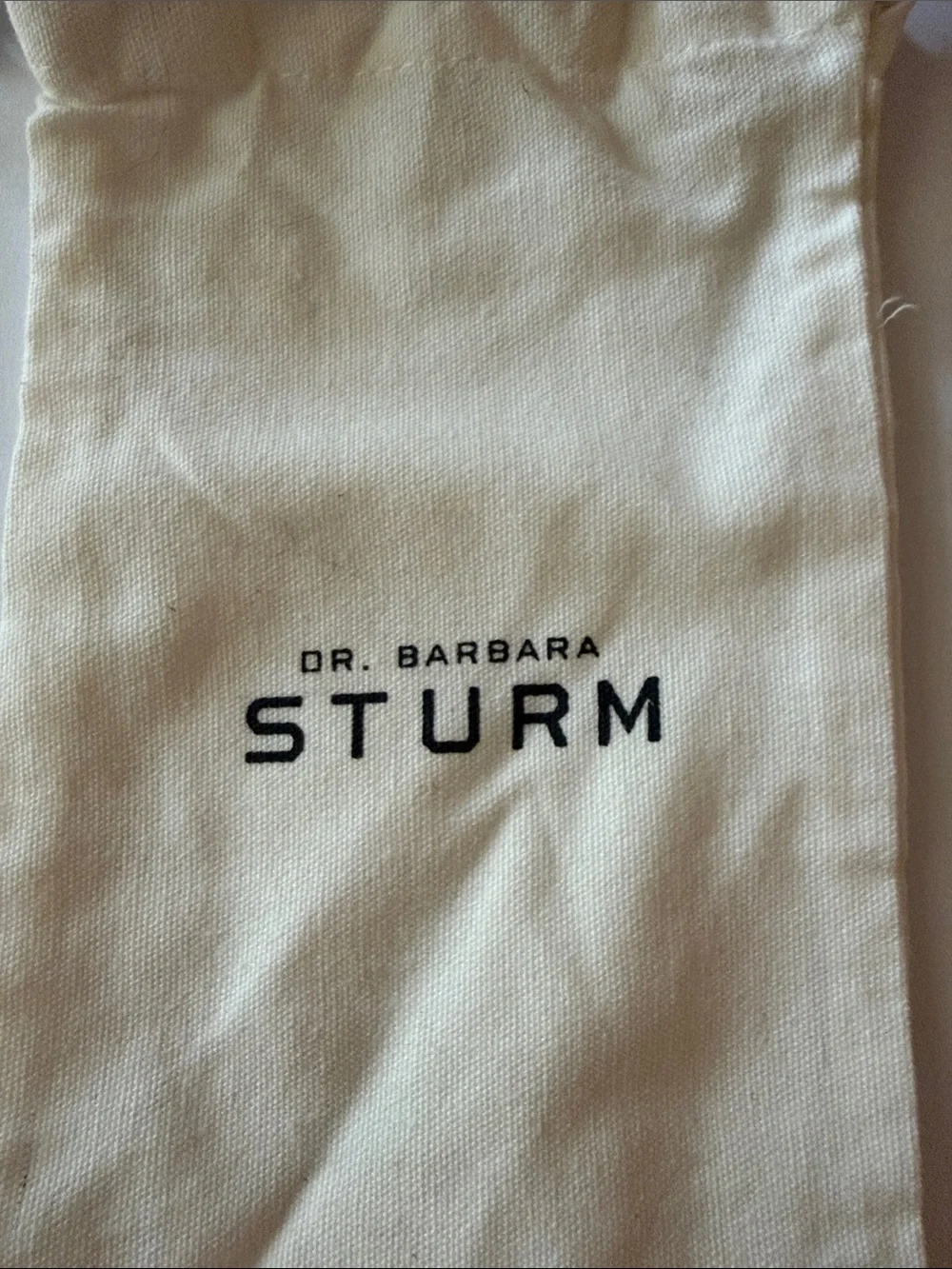 NWOT Dr. Barbara Sturm Cream Canvas Drawstring Bag with Black Logo